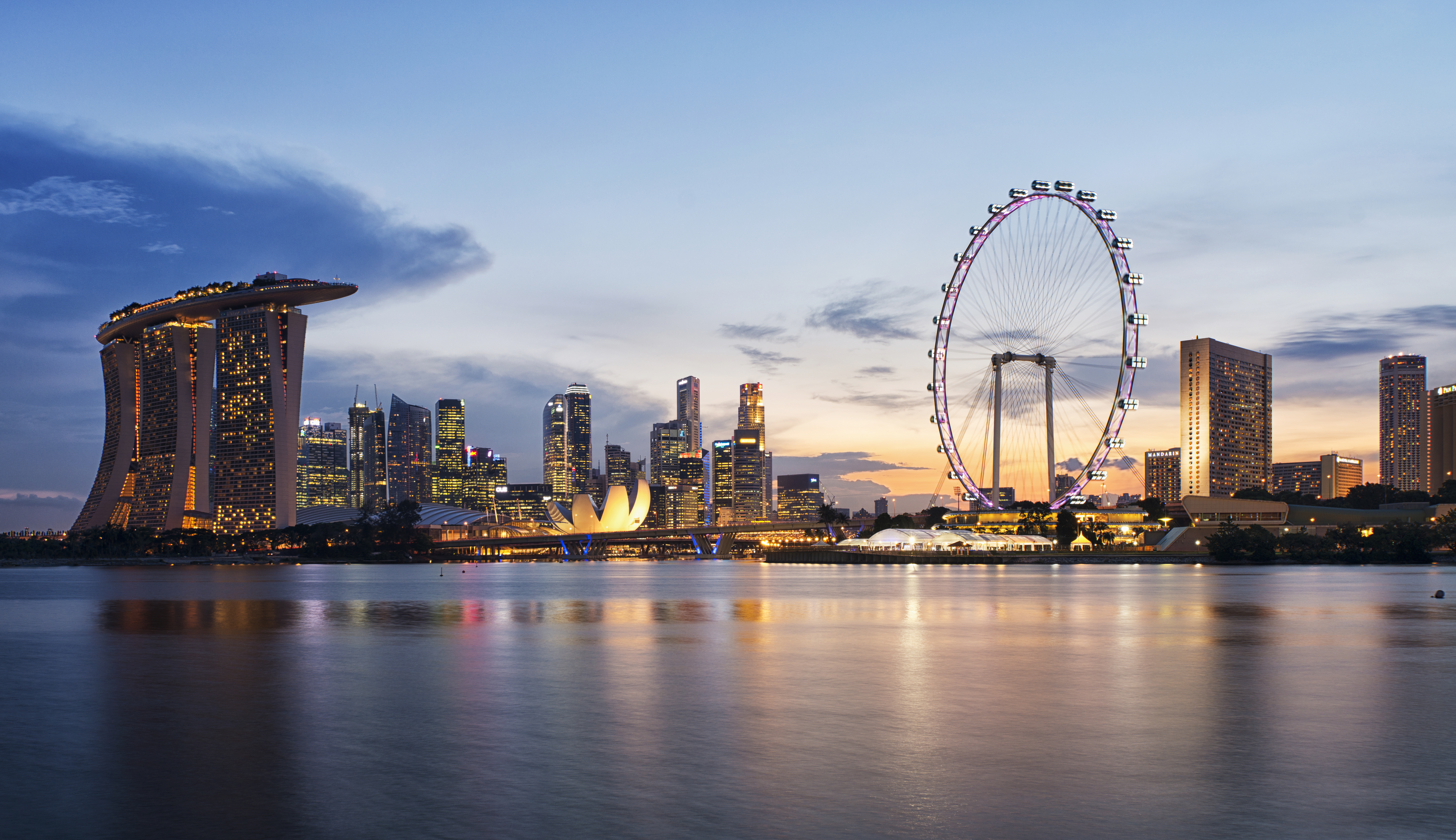 Singapore skyline at sunset viewed from Gardens by the Bay